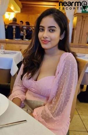 Teen escort disha on the bed